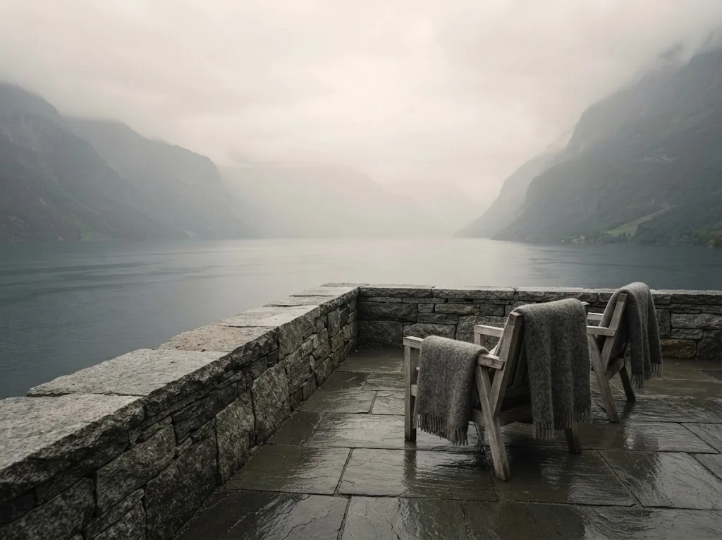 Artist's impression of a small private terrace above the water with two chairs and a low stone wall